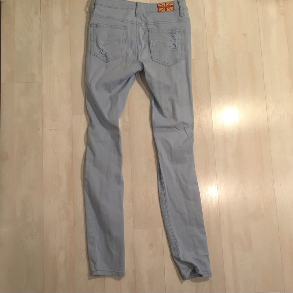 Light blue ripped skinny jeans